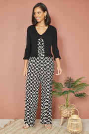 Yumi Black Tie Up Ribbed Cardigan With Frill Hem
